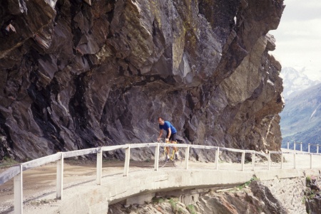 Jobst Brandt on Gavia Pass, in the late 1980s. A tunnel was built about 1991 and this part of the road abandoned. This perspective does not compare to the one made into a poster, but still nice.